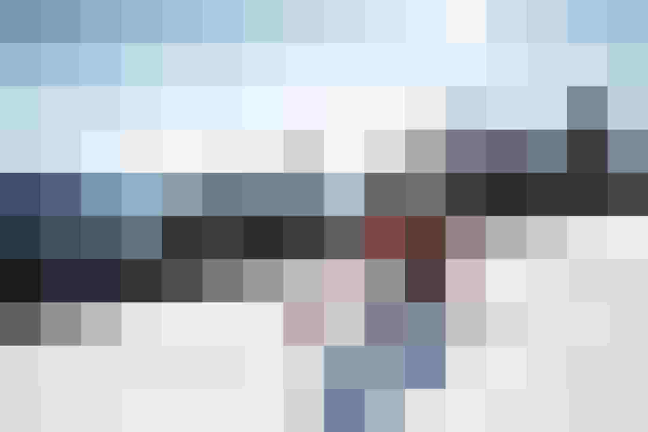 Skiers on mountain slopes